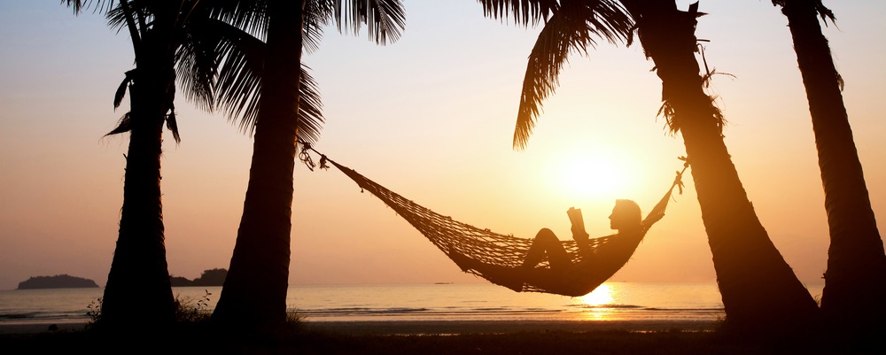 While on vacation to a Caribbean island, Ted Bauman takes another look at the tax benefits of America’s colony.