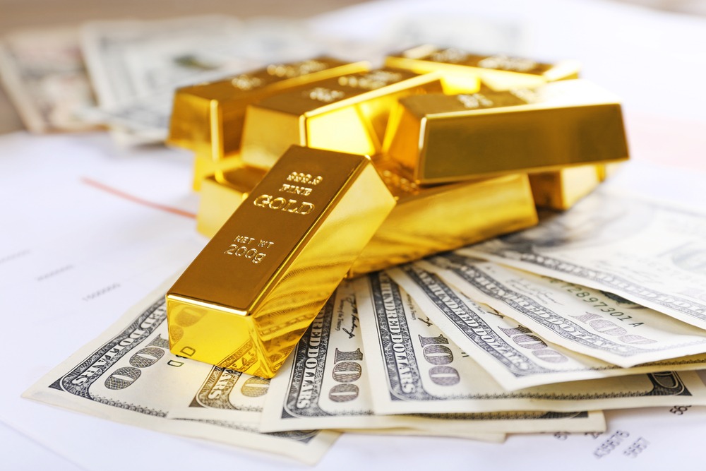 Gold bricks on money