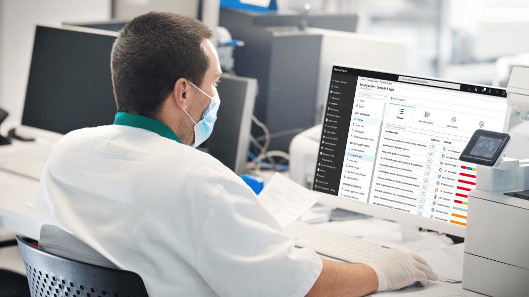 health care worker on computer 