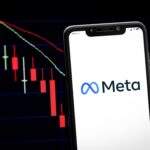 Smartphone with Meta app and stock crashing
