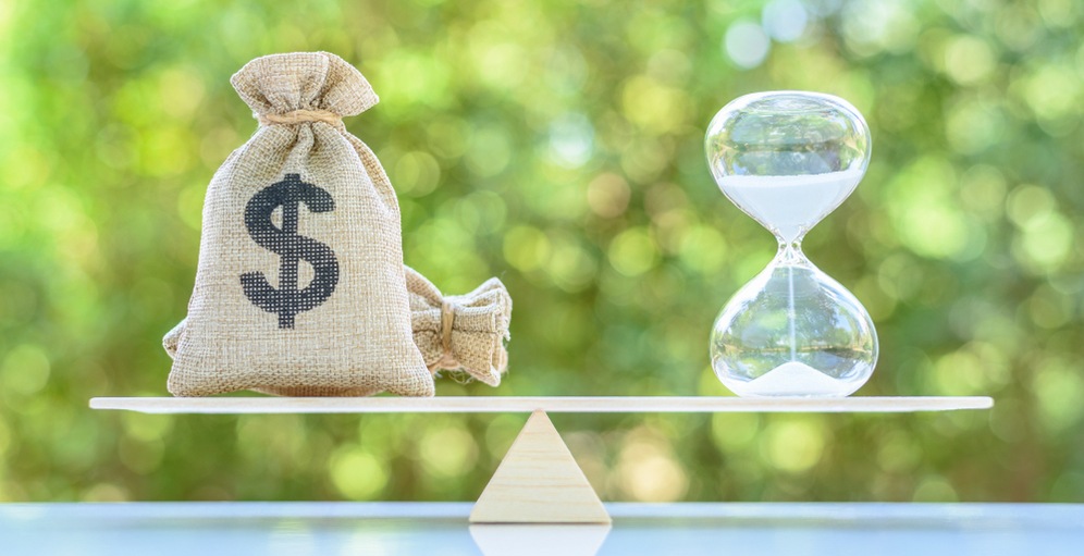 Options Trading Strategy bag of money with hour glass