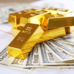 Gold bricks on money