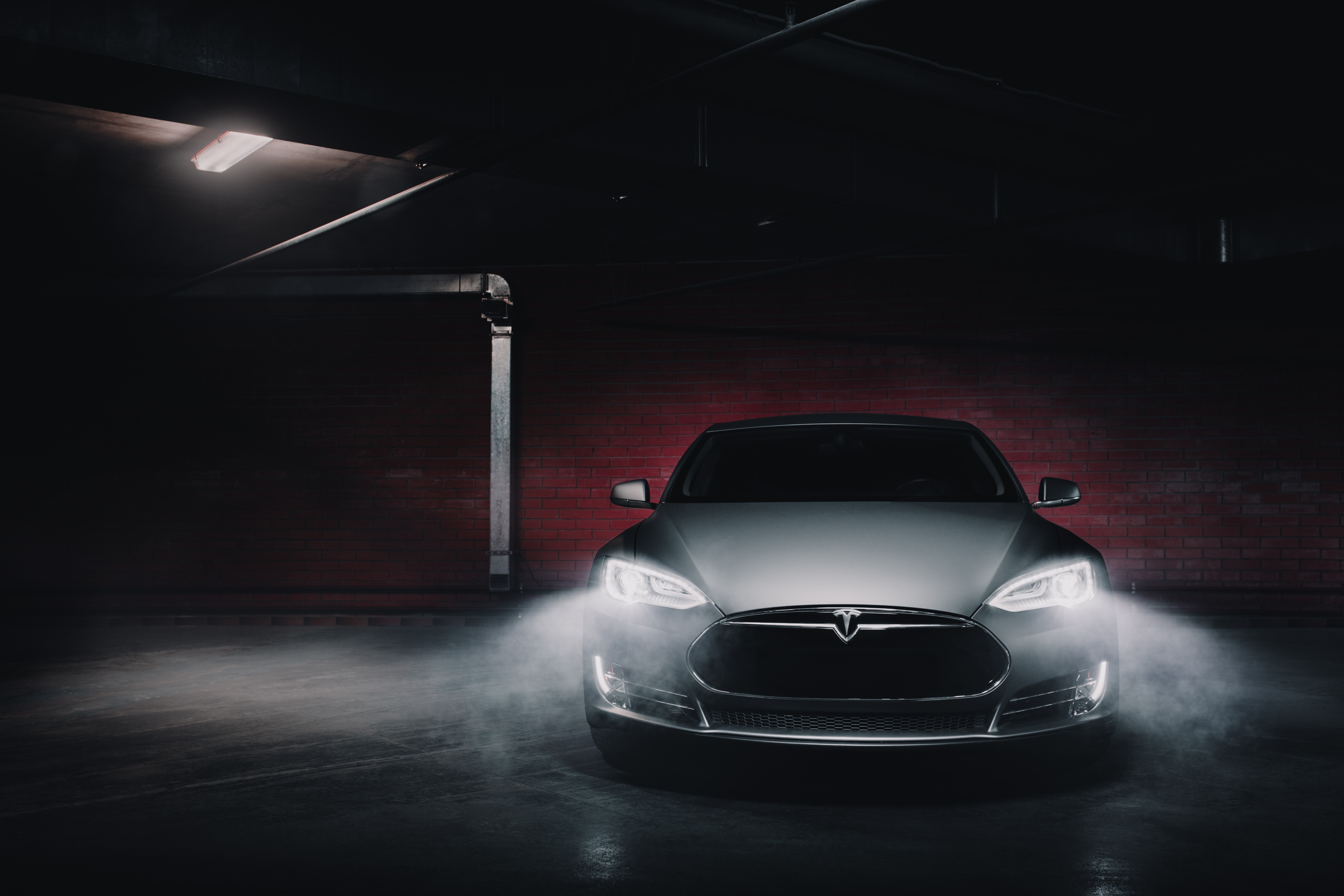 tesla car in garage