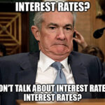 The Fed continues to issue economic warnings, but is Wall Street listening? And is (or was) Apple really a $2 trillion company?