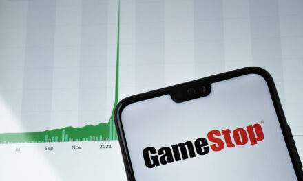 Picture of Gamestop Logo on Phone with graph trending up