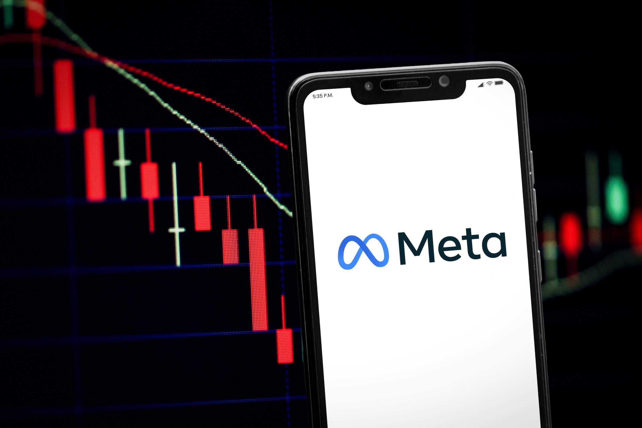 Smartphone with Meta app and stock crashing