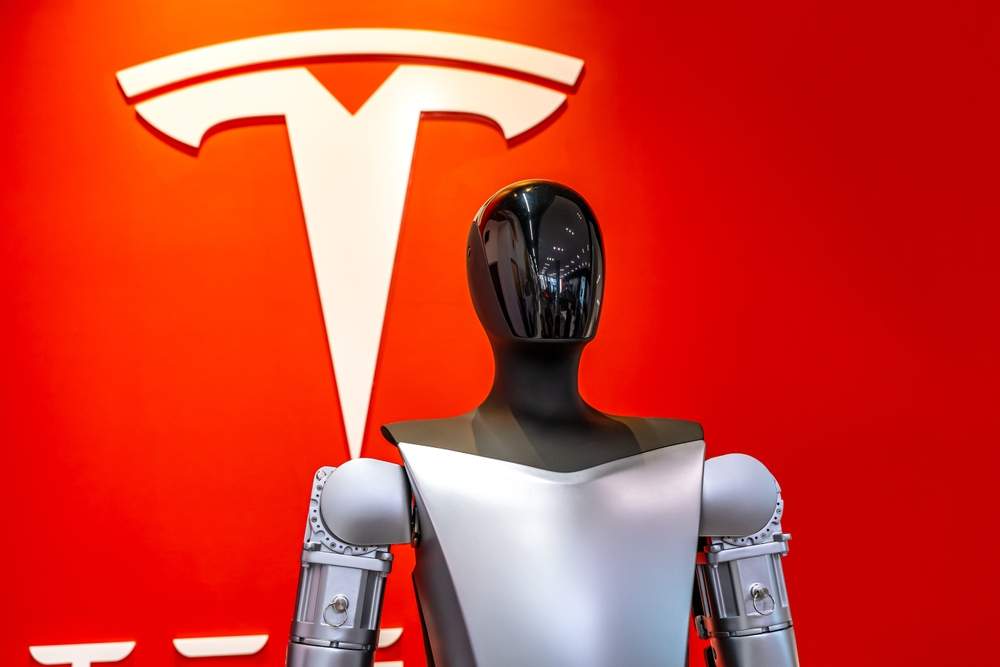 Tesla logo with robot in front